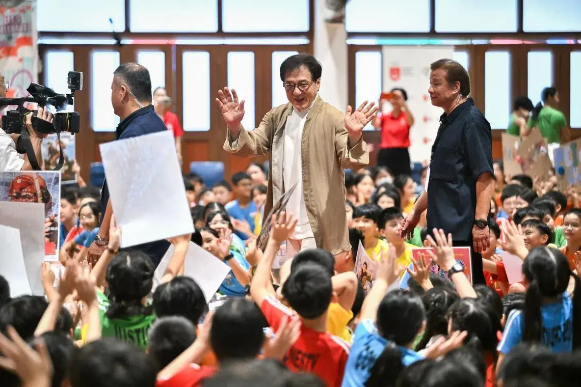 ‘Help others when you’re successful one day’: Action star Jackie Chan encourages Pei Chun pupils
